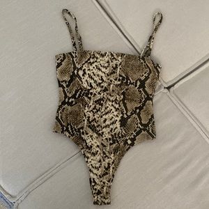 Animal print body suit